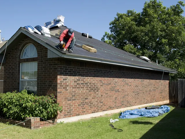 Roofer working on a pitched roof