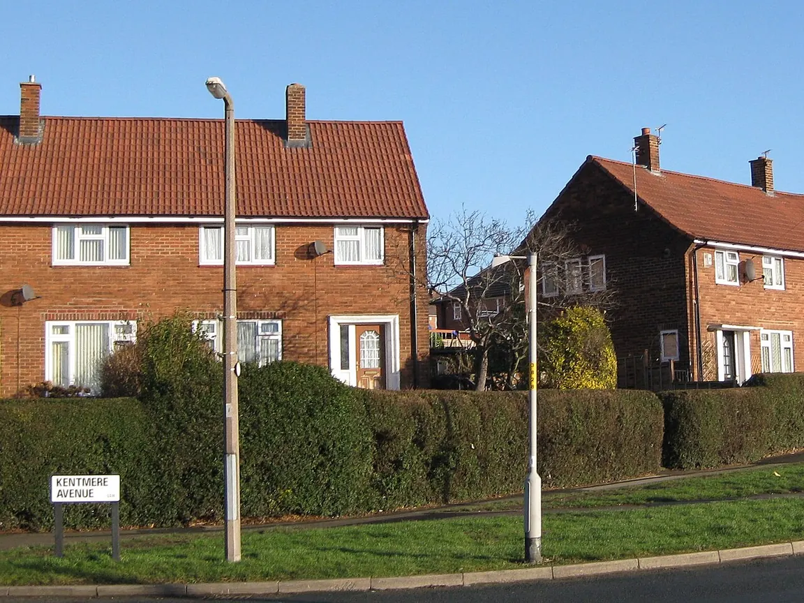 Street of red-brick semi-detached houses
